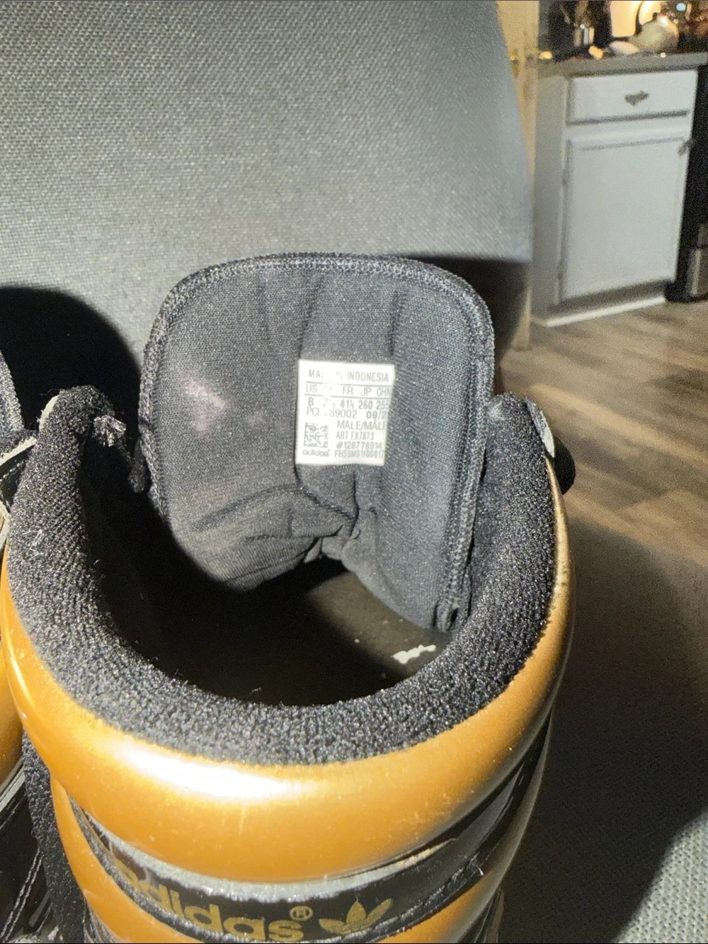 adidas Kids Black and Gold High-Top Sneakers